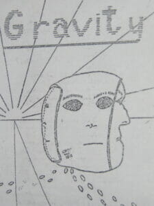 A head with 3 faces on a road at sunset, or is it sunrise? Drawing
